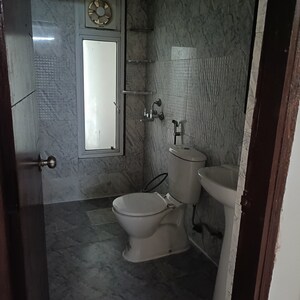 Bathroom in 2 BHK Apartment at Prateek Grand City, Siddharth Vihar – for Rent