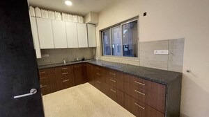 Kitchen in 3 BHK Apartment at Oberoi Realty Esquire, Goregaon East – for Rent