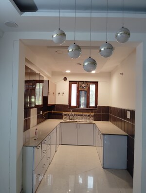 Kitchen in 4 BHK Builder Floor at Ashoka Enclave – for Sale