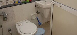 Bathroom in 1 BHK Apartment at K Raheja Heights, Malad East – for Rent