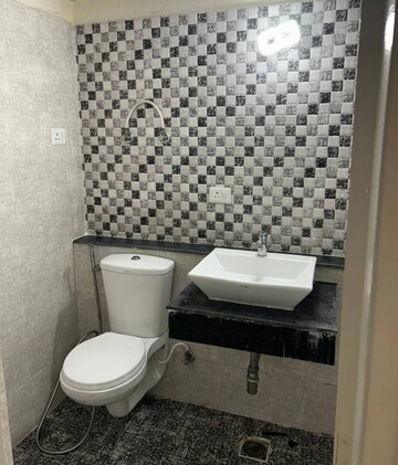 Bathroom in 3 BHK Apartment at Shri Radha Sky Gardens, Sector 16b Greater Noida – for Rent