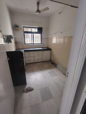 Bathroom in 2 BHK Apartment at Satellite Garden, Goregaon East – for Rent