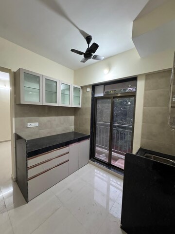 Kitchen in 2 BHK Apartment at K M Horizon Palms, Owale – for Rent