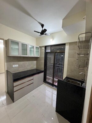 Kitchen in 2 BHK Apartment at K M Horizon Palms, Owale – for Rent