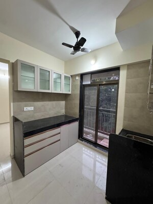 Kitchen in 1 BHK Apartment at K M Horizon Palms, Owale – for Rent