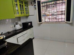 Kitchen in 2 BHK Apartment at Marble Arch Apartment, Andheri West – for Sale