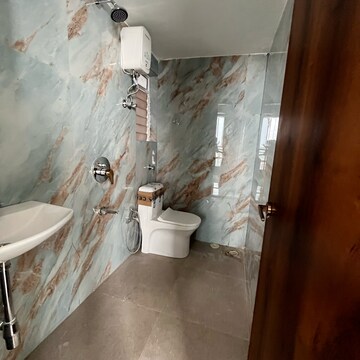 Bathroom in 1 BHK Apartment at Pramanik Walchand Paradise, Kanakia Road – for Rent