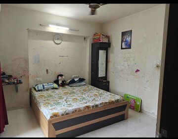 Bedroom in 2 BHK Apartment at Kumbare Township, Kothrud – for Sale