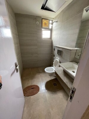 Bathroom in 2 BHK Apartment at Shapoorji Pallonji Joyville Gurgaon, Sector 102 – for Rent