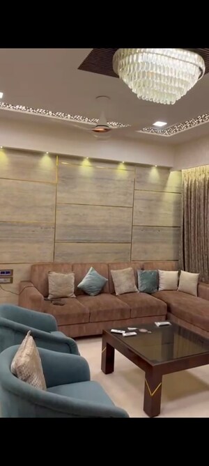 Living Room in 2 BHK Apartment at Transcon Triumph Tower, Andheri West – for Sale