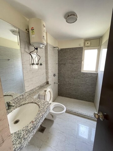 Bathroom in 2 BHK Apartment at Shapoorji Pallonji Joyville Gurgaon, Sector 102 – for Rent