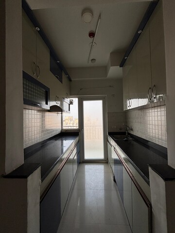 Kitchen in 2 BHK Apartment at Panchsheel Greens II, Sector 16 Greater Noida – for Rent