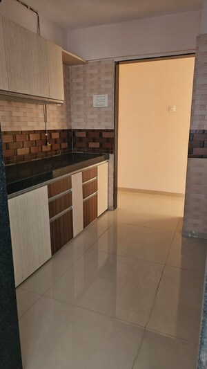 Kitchen in 2 BHK Apartment at Jangid Galaxy, Ghodbunder Road – for Sale
