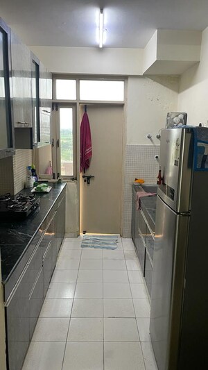 Kitchen in 2 BHK Apartment at RAS Palm Residency, Sector 76 – for Rent