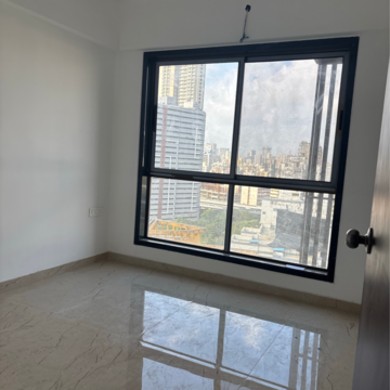 Room in 2 BHK Apartment at Divine Aspen Garden, Sonawala Industry Estate – for Sale