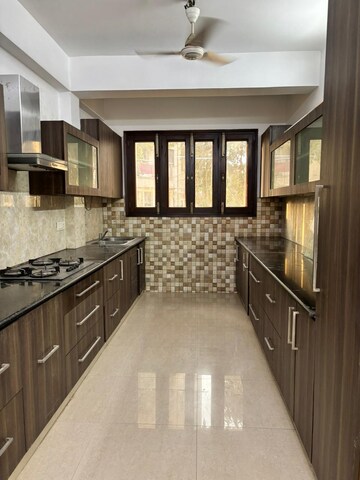 Kitchen in 4 BHK Apartment at Jasminium Apartment, Sector 45 – for Sale