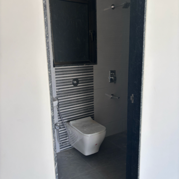 Attached Bathroom in 2 BHK Apartment at Chandak Stella, Udyog Nagar – for Rent