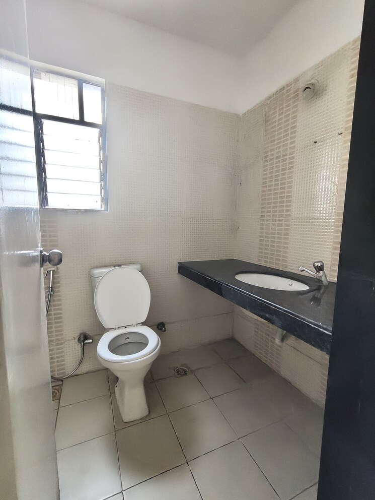 Bathroom, nagpal-dev-exotica 2 Bedroom 1000 Sq.Ft. Apartment In Kharadi Pune 9394979