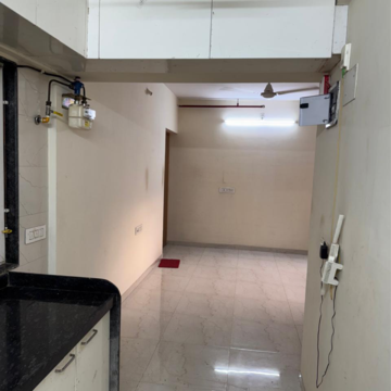 Kitchen in 1 BHK Apartment at Bhoomi Samarth C Wing, Sonawala Industry Estate – for Sale