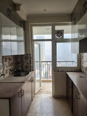 Kitchen in 3 BHK Apartment at Amrapali Leisure Park, Amrapali Leisure Valley – for Rent