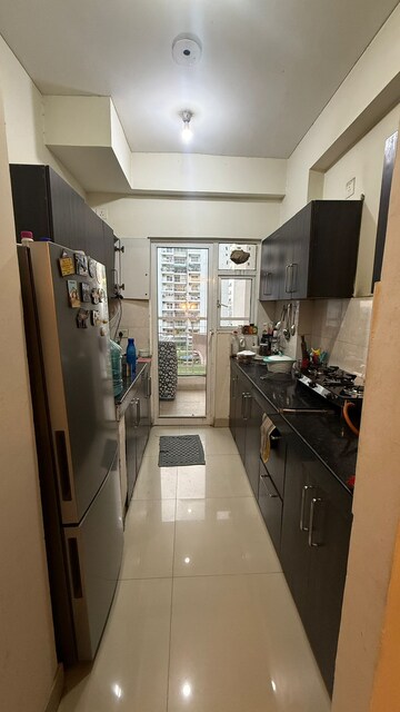 Master Bedroom in 2.5 BHK Apartment at VVIP Homes, Gaur City 2 – for Rent