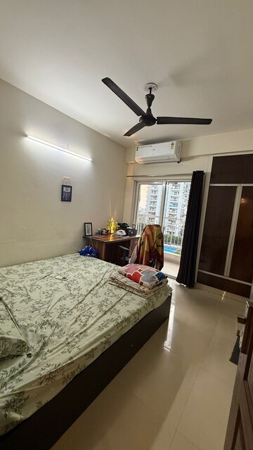 Bedroom in 2.5 BHK Apartment at VVIP Homes, Gaur City 2 – for Rent