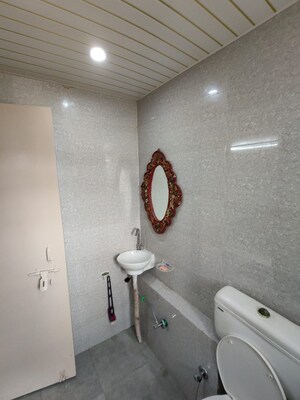 Bathroom in 2 BHK Apartment at Conscient Habitat 78, Sector 78 – for Rent