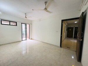 Living Room in 1.5 BHK Apartment at Lodha Lakeshore Greens, Dombivli East – for Sale