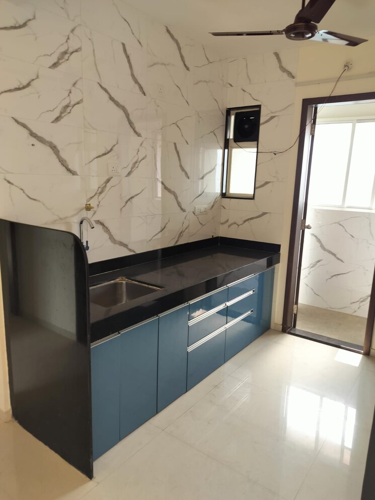 Kitchen, blue-27th-avenue 3 Bedroom 1500 Sq.Ft. Apartment In Bavdhan Pune 9395686