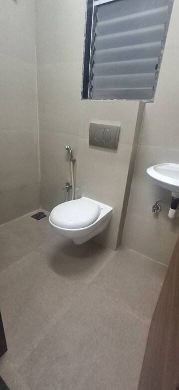 Bathroom in 1 BHK Apartment at Je And Vee Om Trimurti, Malad East – for Rent
