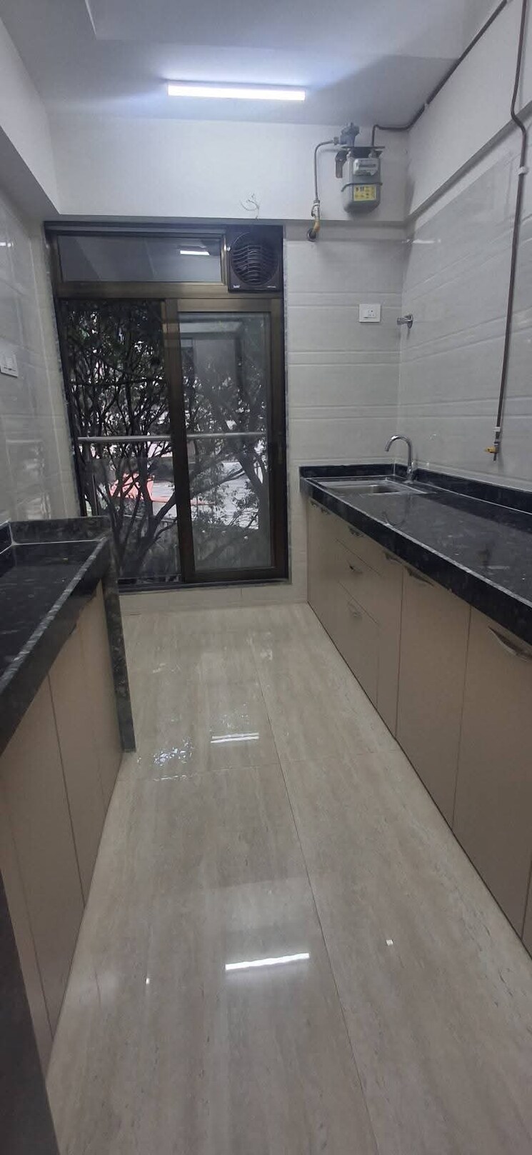 Kitchen, je-and-vee-om-trimurti 1 Bedroom 645 Sq.Ft. Apartment In Malad East Mumbai 9395719