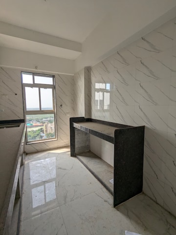 Kitchen in 1 BHK Apartment at Dharti Pressidio, Kandivali West – for Sale