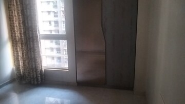 Bedroom in 2 BHK Apartment at Lodha Amara, Kolshet Road – for Rent