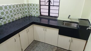 Kitchen in 2 BHK Apartment at Rasta Peth – for Rent