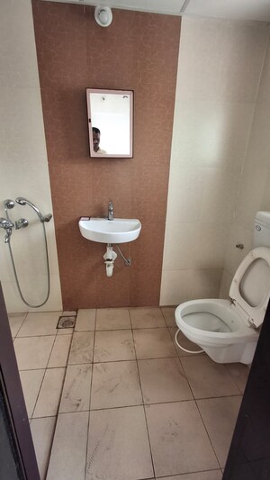 Bathroom in 3 BHK Apartment at Paranjape Madhukosh Phase III, Dhayari – for Rent