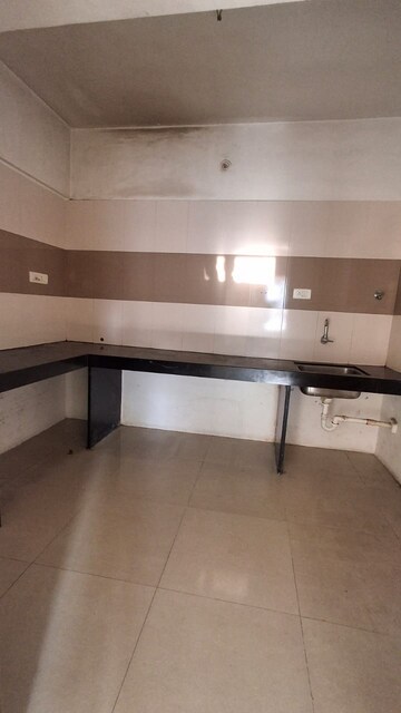 Kitchen in 3 BHK Apartment at Paranjape Madhukosh Phase III, Dhayari – for Rent