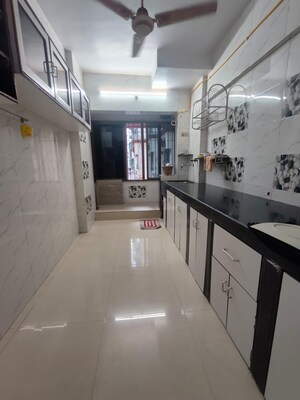 Kitchen in 2 BHK Apartment at Atul Blue Orbit, Malad West – for Rent