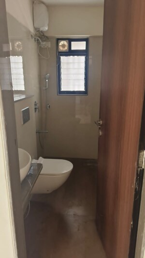 Bathroom in 1 BHK Apartment at Sheth Irene, Malad West – for Rent