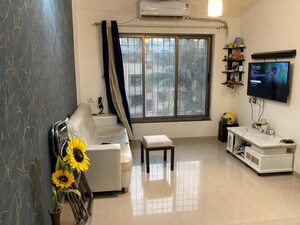 Living Room in 2 BHK Apartment at Neelkanth Palms Phase 2, Thane West – for Rent