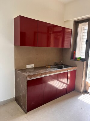 Kitchen in 2.5 BHK Apartment at Bhimjyani Verraton, Manpada – for Sale