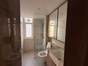Bathroom in 4 BHK Builder Floor at DLF Gardencity Enclave, Sector 93 – for Sale