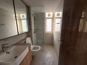 Bathroom in 4 BHK Builder Floor at DLF Gardencity Enclave, Sector 93 – for Sale