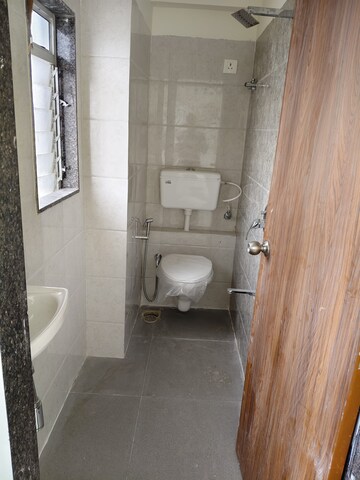 Bathroom in 2 BHK Apartment at A K Aaditya Residences, Girgaon – for Rent