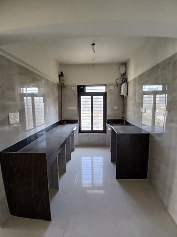 Kitchen in 2 BHK Apartment at Aasamanta Krupa, Goregaon East – for Rent