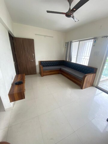 Living Room in 2 BHK Apartment at Goyal My Home Kiwale, Kiwale – for Sale