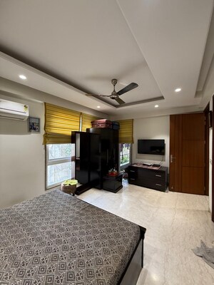 Bedroom in 3 BHK Builder Floor at Nehru Enclave – for Rent