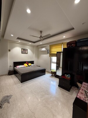 Bedroom in 3 BHK Builder Floor at Nehru Enclave – for Rent