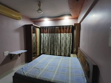 Bedroom in 3 BHK Apartment at Riddhi Gardens CHS, Malad East – for Rent