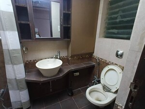 Bathroom in 3 BHK Apartment at Riddhi Gardens CHS, Malad East – for Rent