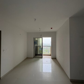 Living Room in 3 BHK Apartment at Lodha Codename Premier, Mangaon – for Sale